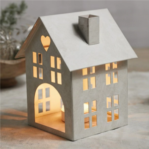 House-shaped candle holder with votive candle