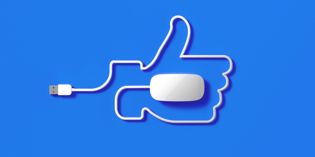 white mouse cable forming a facebook thumbs up symbol