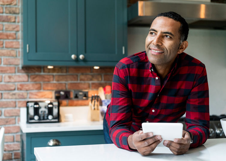 Real estate appraiser inspecting a kitchen