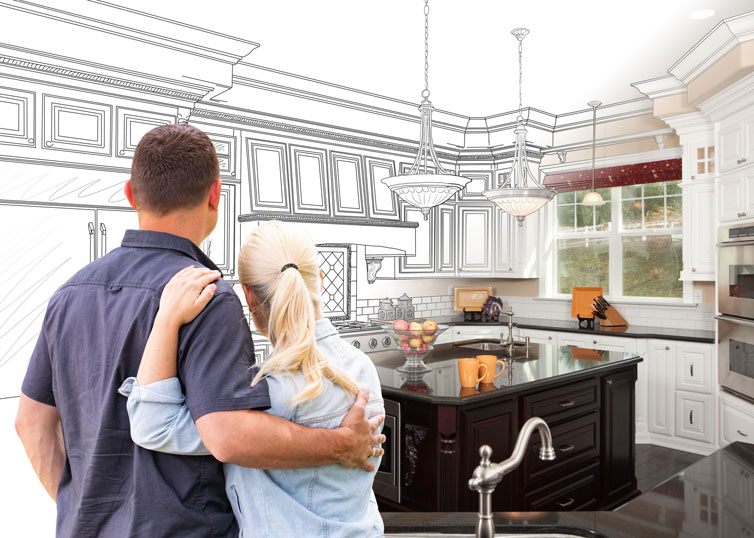 A middle aged couple envisions home renovations in their kitchen