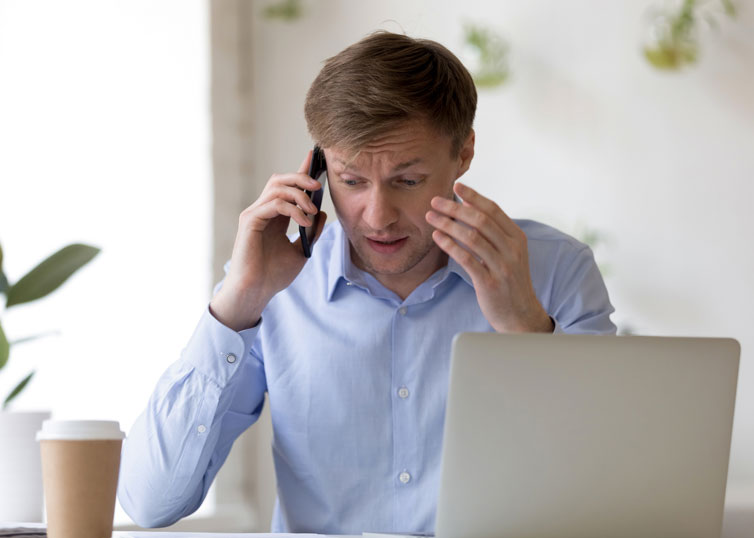 Real estate appraiser working with difficult clients over the phone