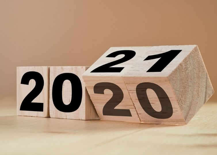Flipping wooden cubes for new year change 2020 to 2021